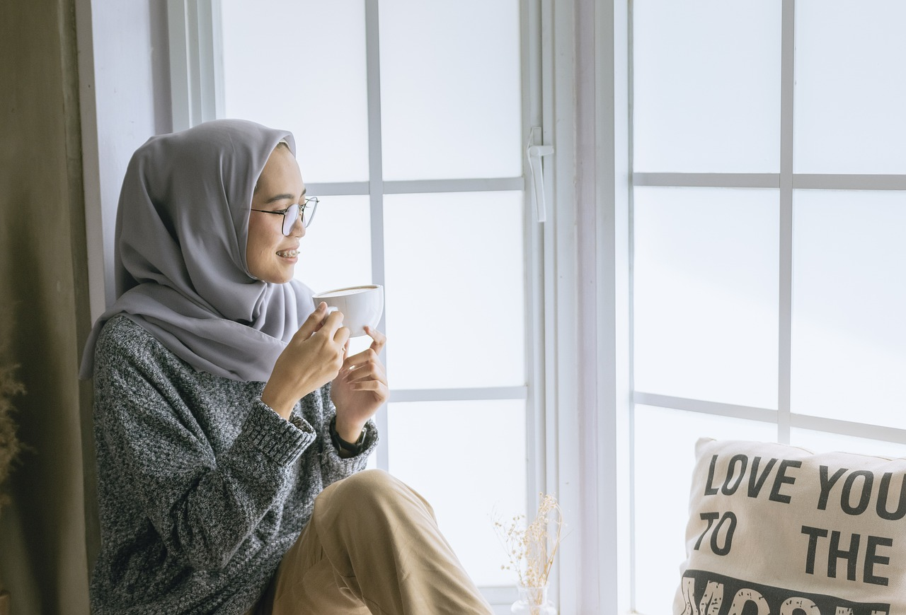 A girl having a cup of tea